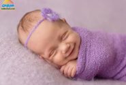 چرا نوزادان در خواب، لبخند به لب می‌آورند؟